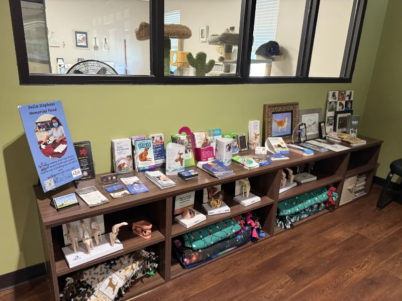 Pet care information table at the Arlington Animal Clinic.